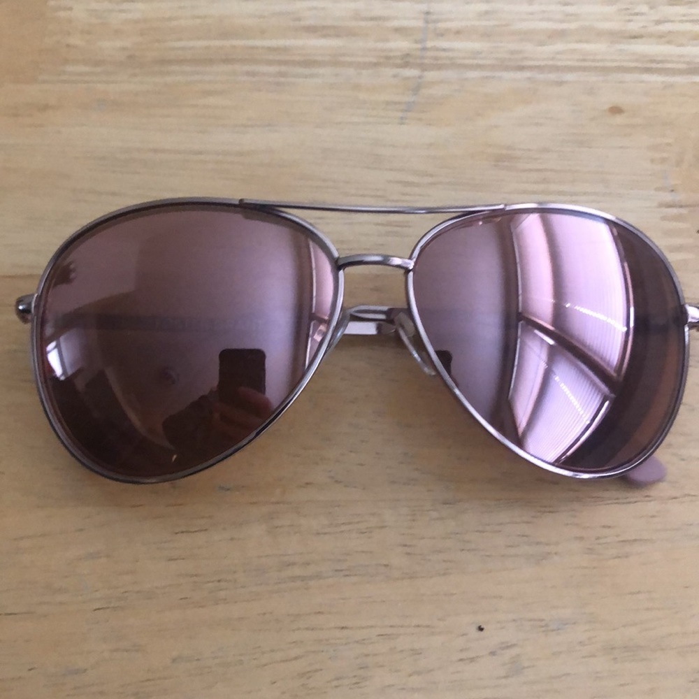 A pair of foster grant sunglasses, never been worn